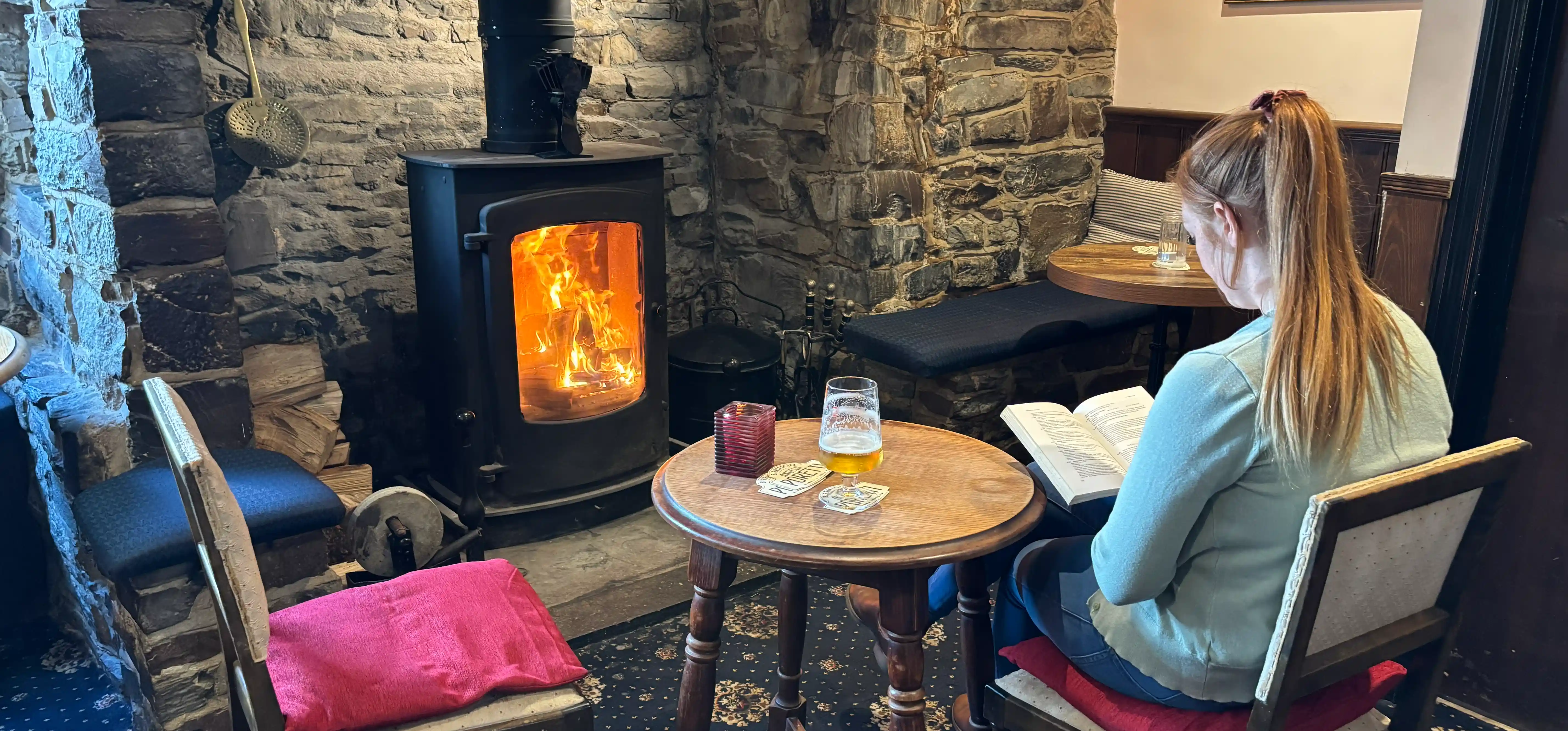 A wood-burning stove inside The Anchor Inn